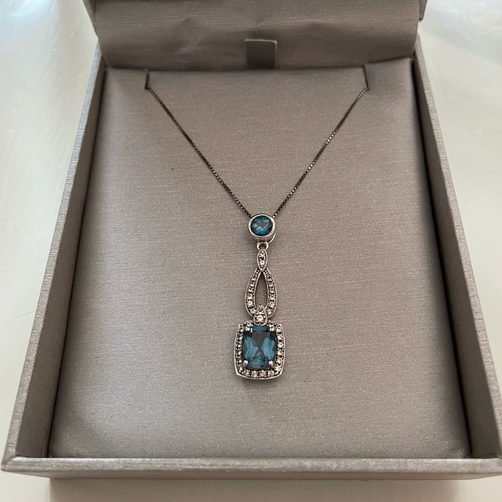 Sterling silver necklace with diamonds and blue gemstones